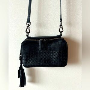 TUMI leather crossbody handbag with tassel
